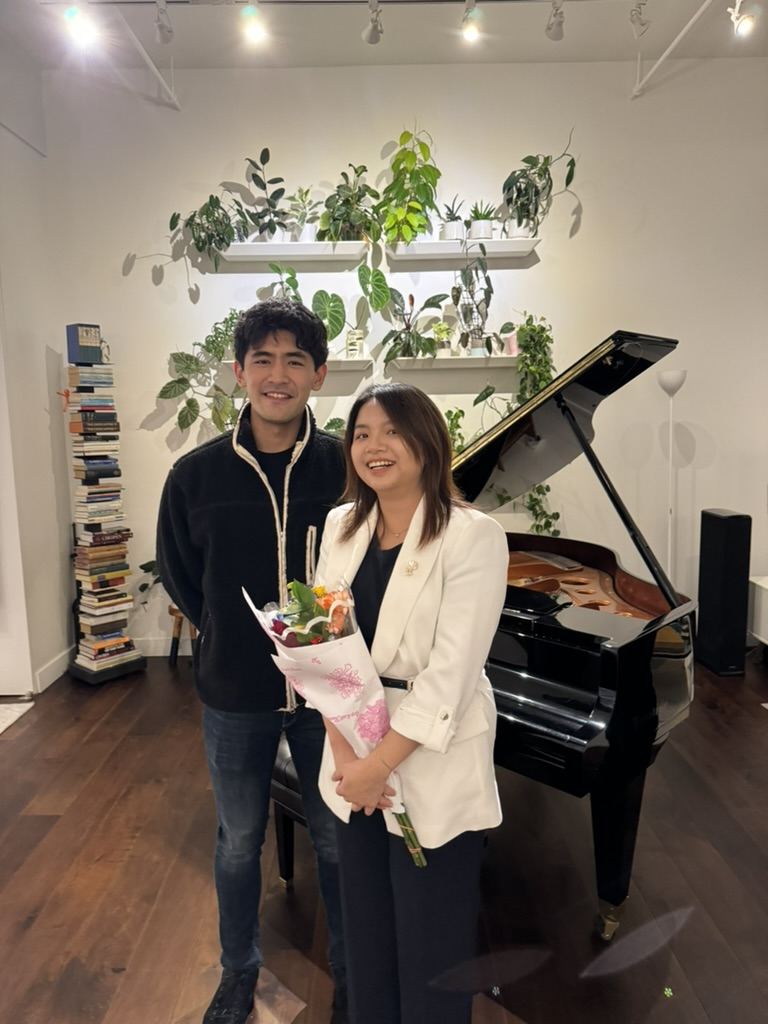 A guest photographed with Zitong Wang after her recital