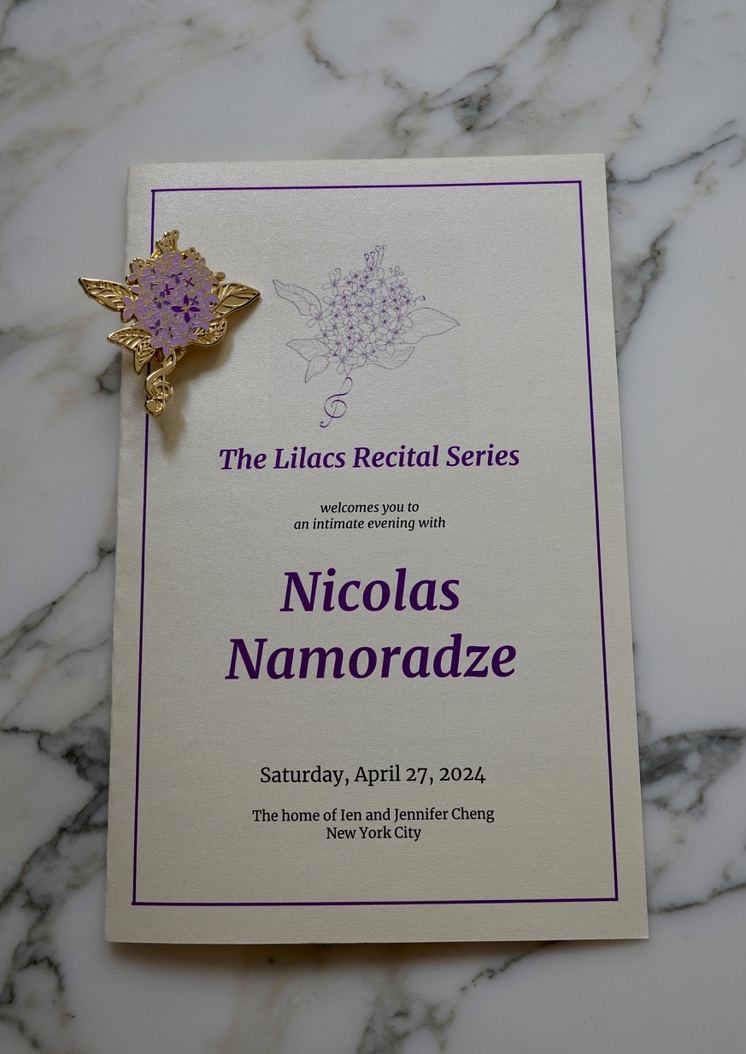 The program, and the lilac pin