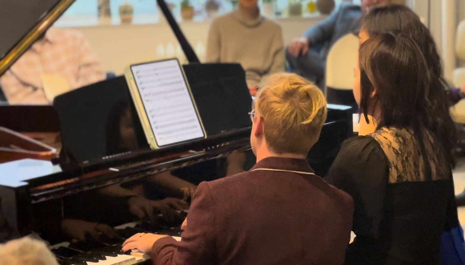 Six hands, one piano